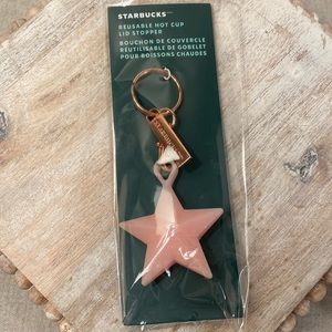 Starbucks 2023 holiday reusable hot cup lid stopper key chain.